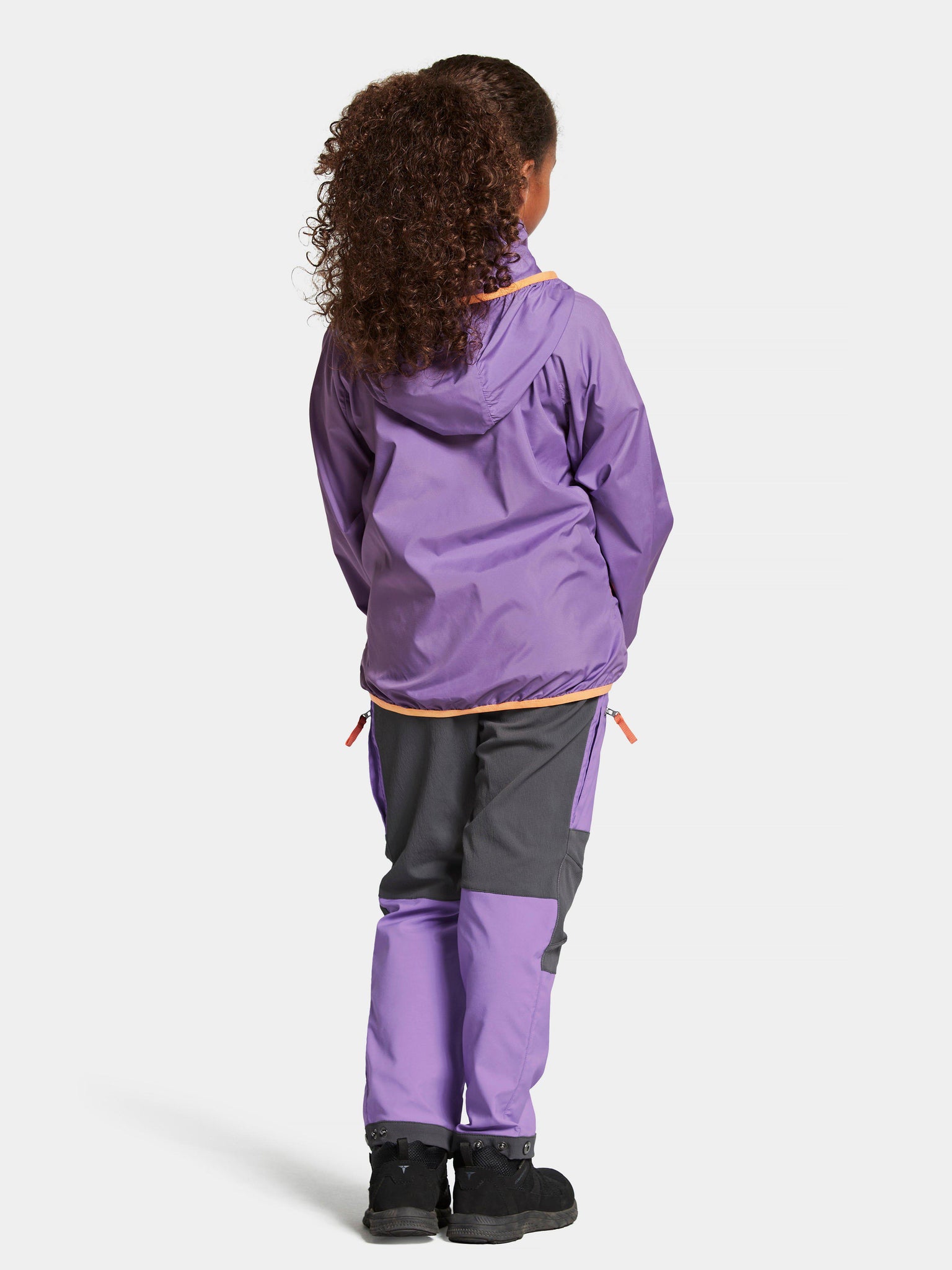 Windbreaker jacket packed in a bag <tc>Didriksons</tc>  Maskros Packable